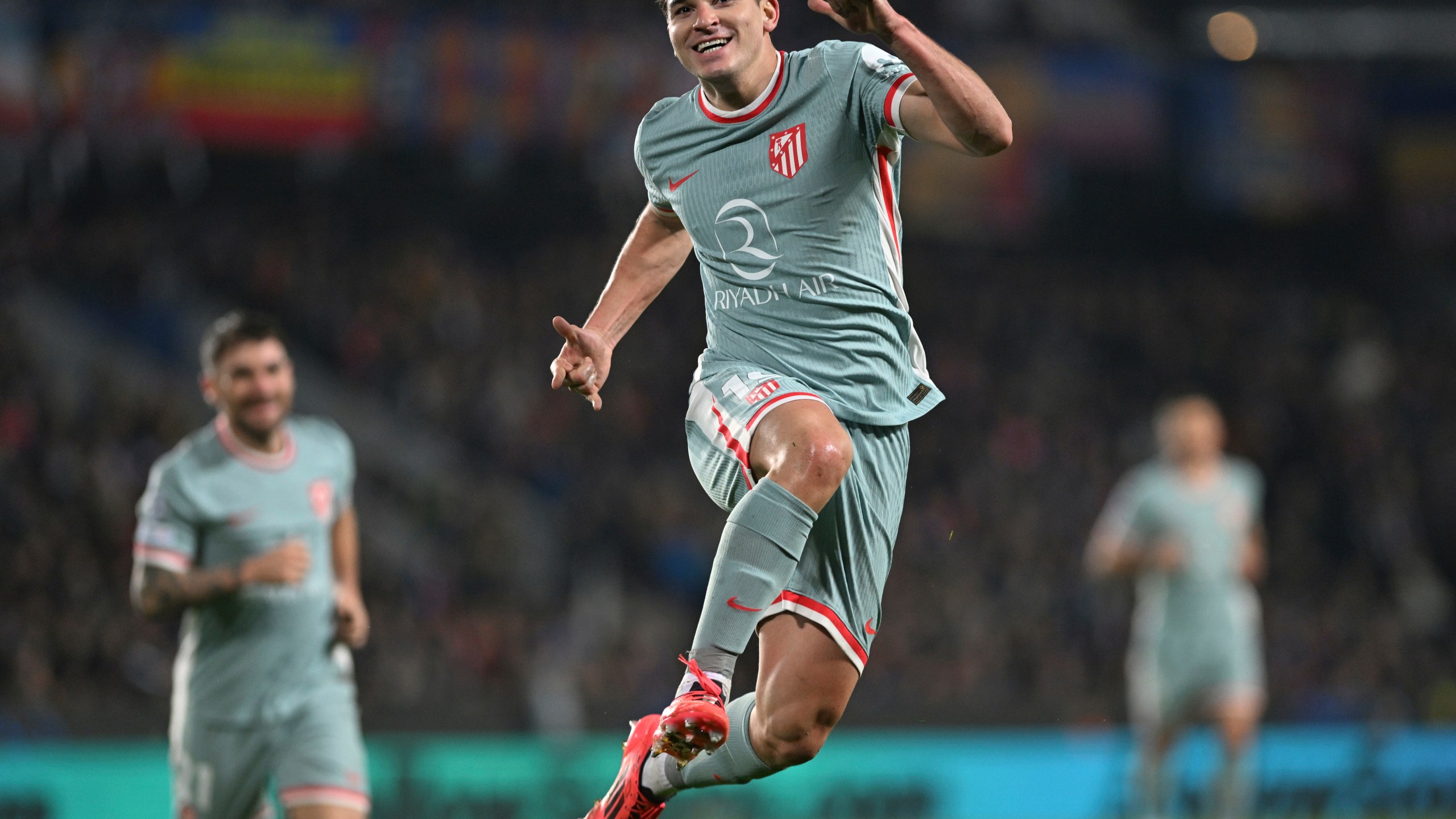 Atletico's Julian Alvarez celebrates after scoring the opening goal during the Champions League opening phase soccer match between between Sparta Prague and Athletico Madrid in Prague, Czech Republic, Tuesday, Nov. 26, 2024. (Michaela Rihova/CTK via AP)