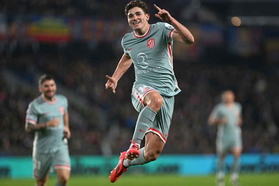 Atletico's Julian Alvarez celebrates after scoring the opening goal during the Champions League opening phase soccer match between between Sparta Prague and Athletico Madrid in Prague, Czech Republic, Tuesday, Nov. 26, 2024. (Michaela Rihova/CTK via AP)