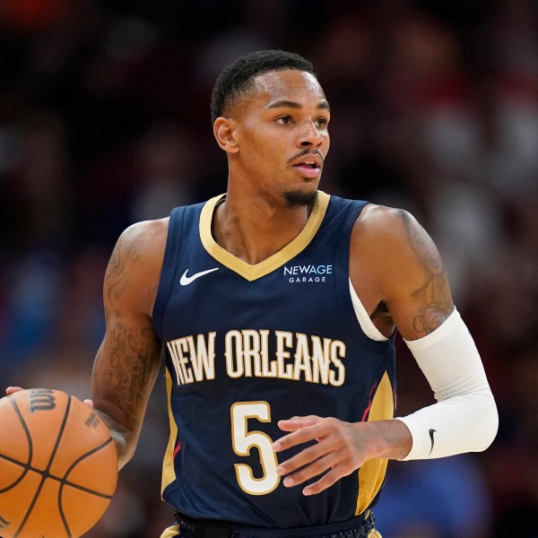 FILE - New Orleans Pelicans guard Dejounte Murray dribbles against the Houston Rockets during the second half of an NBA preseason basketball game, Oct. 15, 2024, in Houston. (AP Photo/Eric Christian Smith, File)