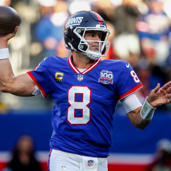 FILE - New York Giants quarterback Daniel Jones (8) passes the ball against the Washington Commanders during the third quarter of an NFL football game, Sunday, Nov. 3, 2024, in East Rutherford, N.J. (AP Photo/John Munson, File)