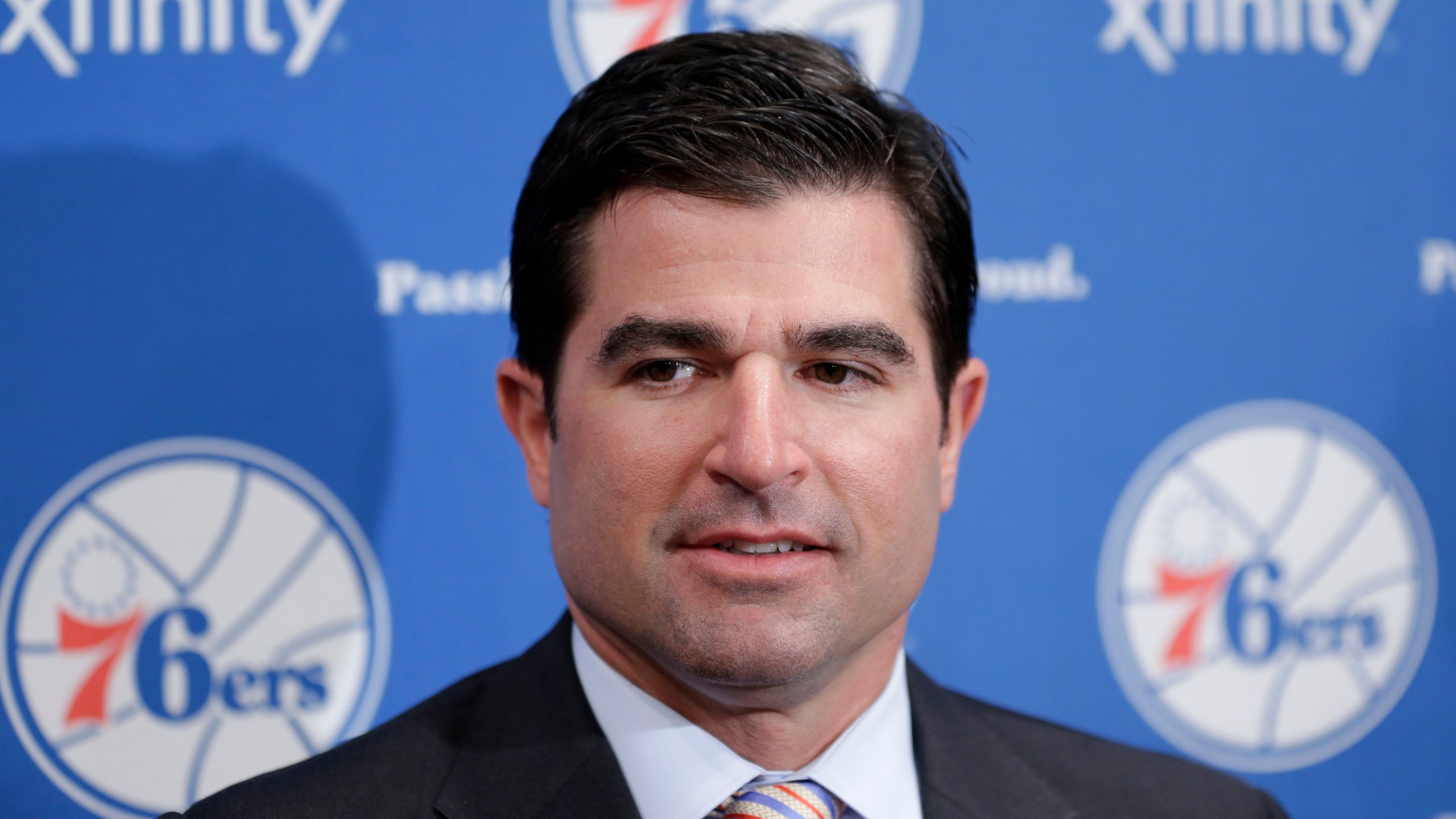 FILE - Philadelphia 76ers incoming chief executive officer Scott O'Neil speaks to reporters at the team's NBA basketball training facility in Philadelphia, July 8, 2013. (AP Photo/Matt Rourke, File)