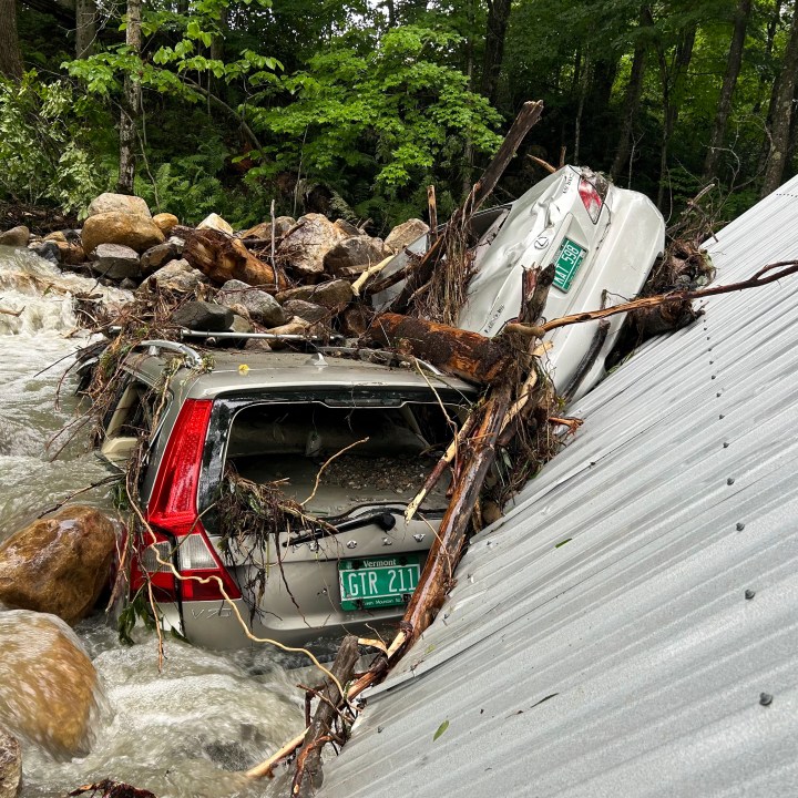 The Mackenzie family's flood-ravaged cars are shown on July 12, 2024, in Peacham, Vt., after severe flooding destroyed their home and vehicles. (Courtesy of Cornelia Hasenfuss via AP)