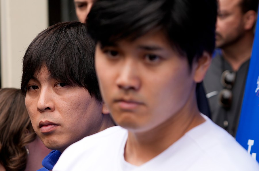 FILE - Ippei Mizuhara, left, stands next to Los Angeles Dodgers baseball player Shohei Ohtani, right, during an interview at Dodger Stadium, Feb. 3, 2024. (AP Photo/Richard Vogel, File)