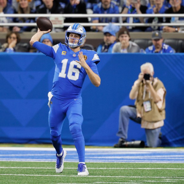 CORRECTS BYLINE Detroit Lions quarterback Jared Goff (16) throws against the Chicago Bears during the first half of an NFL football game, Sunday, Nov. 17, 2024, in Detroit. (AP Photo/Duane Burleson)