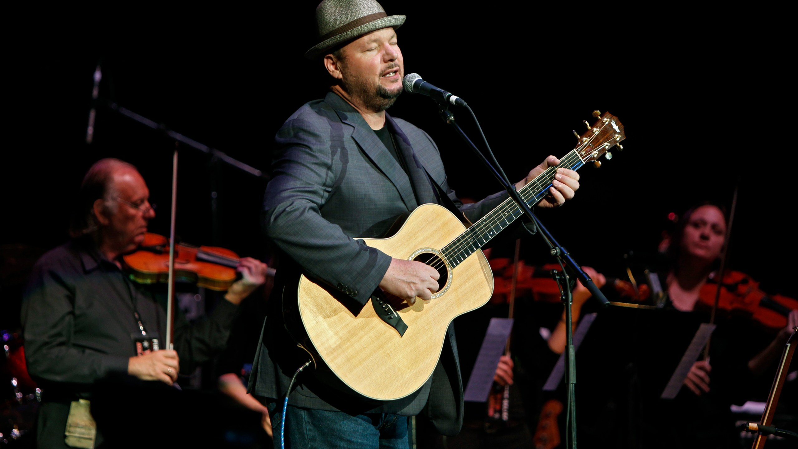 FILE - Christopher Cross performs during the Fire Relief, The Concert For Central Texas at the Frank Erwin Center in Austin, Texas, Monday, Oct. 17, 2011 as part of the all-star lineup of Texas musicians organized to help raise money for victims of the late-summer central Texas wildfires. (AP Photo/Erich Schlegel, File)