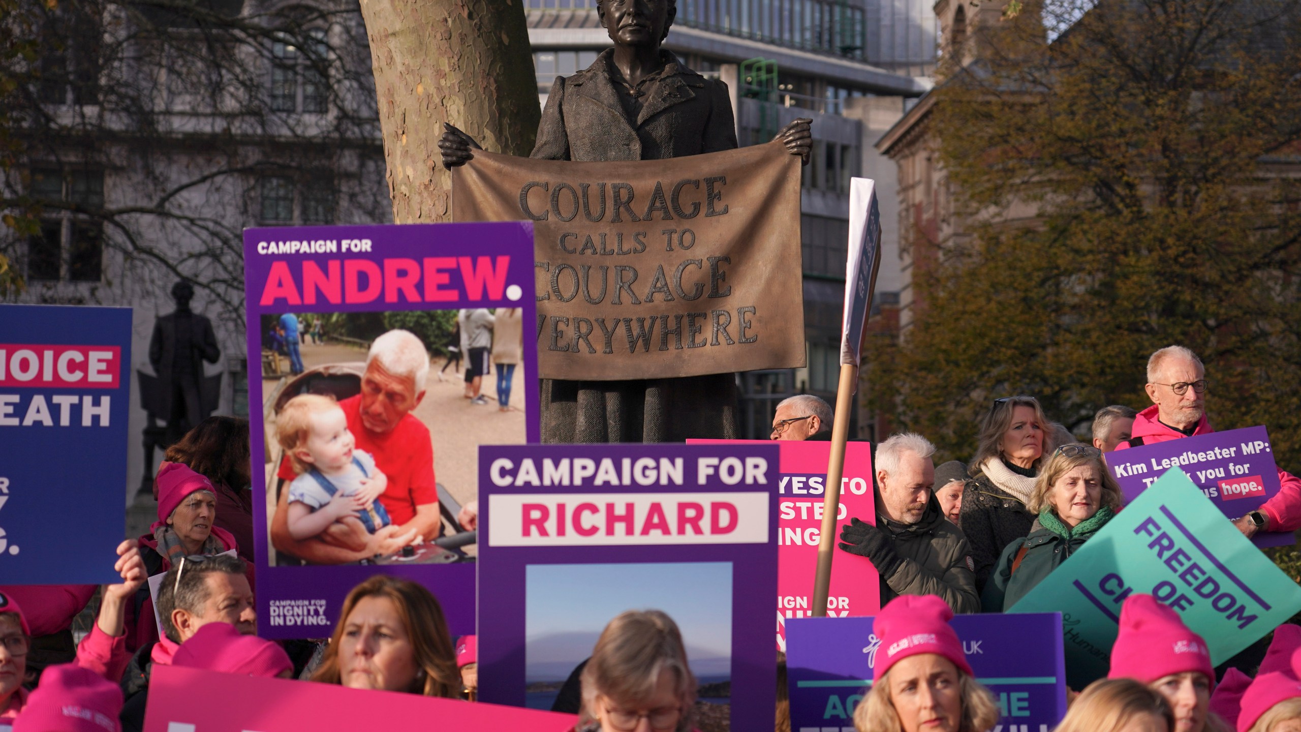 Pro legal assisted dying supporters demonstrate in front of Parliament in London, Friday, Nov. 29, 2024 as British lawmakers started a historic debate on a proposed to help terminally ill adults end their lives in England and Wales.(AP Photo/Alberto Pezzali)