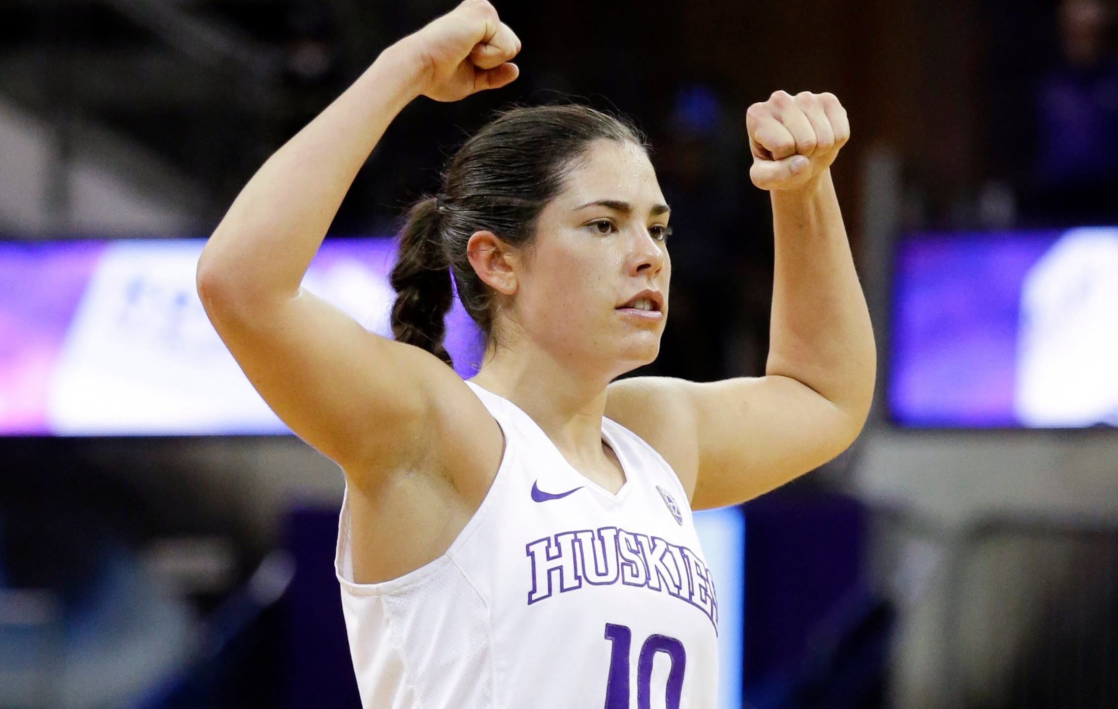 FILE - Washington's Kelsey Plum stretches in the second half of an NCAA college basketball game Sunday, Dec. 11, 2016, in Seattle. (AP Photo/Elaine Thompson, File)