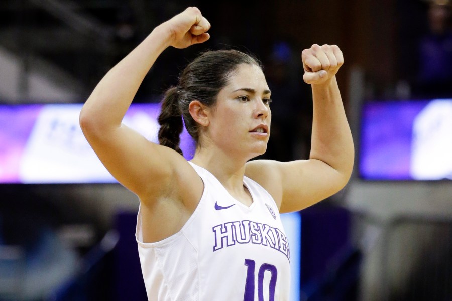 FILE - Washington's Kelsey Plum stretches in the second half of an NCAA college basketball game Sunday, Dec. 11, 2016, in Seattle. (AP Photo/Elaine Thompson, File)