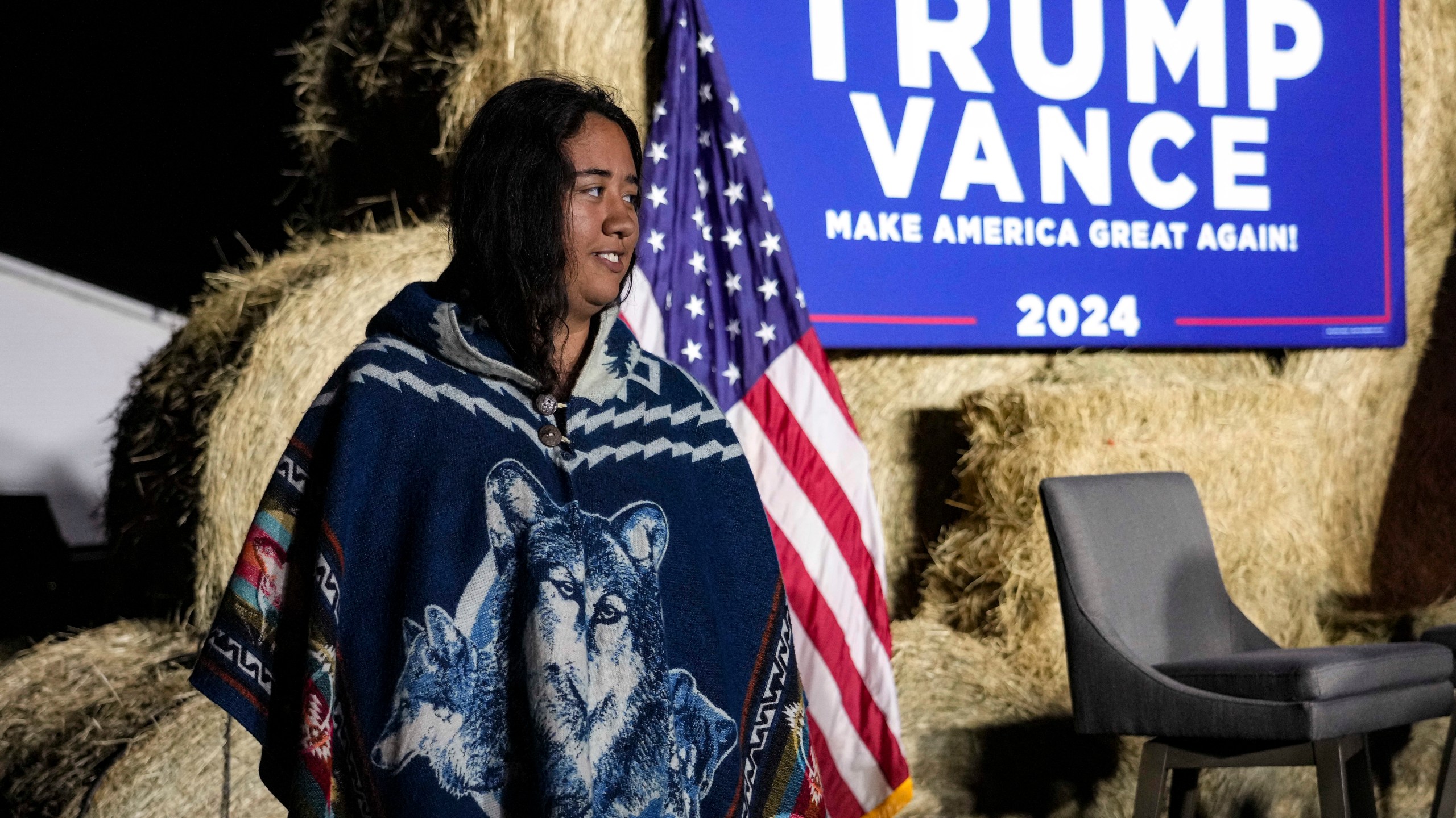 FILE - Abigail Blue, a member of the Lumbee Tribe, walks by the stage during a campaign event in support of Republican presidential nominee former President Donald Trump, Oct. 18, 2024, in Red Springs, N.C. (AP Photo/David Yeazell, File)