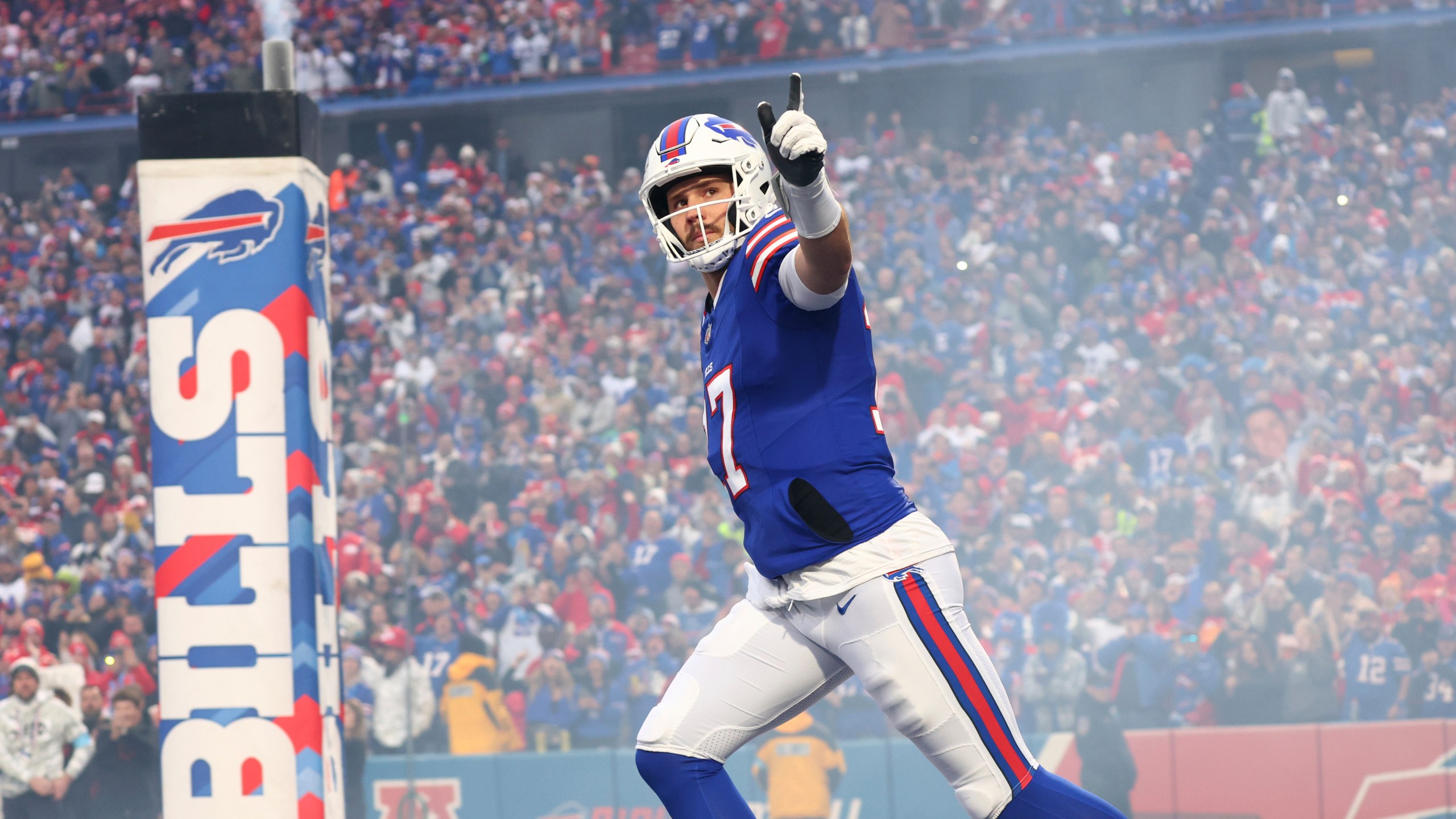 Buffalo Bills quarterback Josh Allen runs onto the field before an NFL football game against the Kansas City Chiefs Sunday, Nov. 17, 2024, in Orchard Park, N.Y. (AP Photo/Jeffrey T. Barnes)