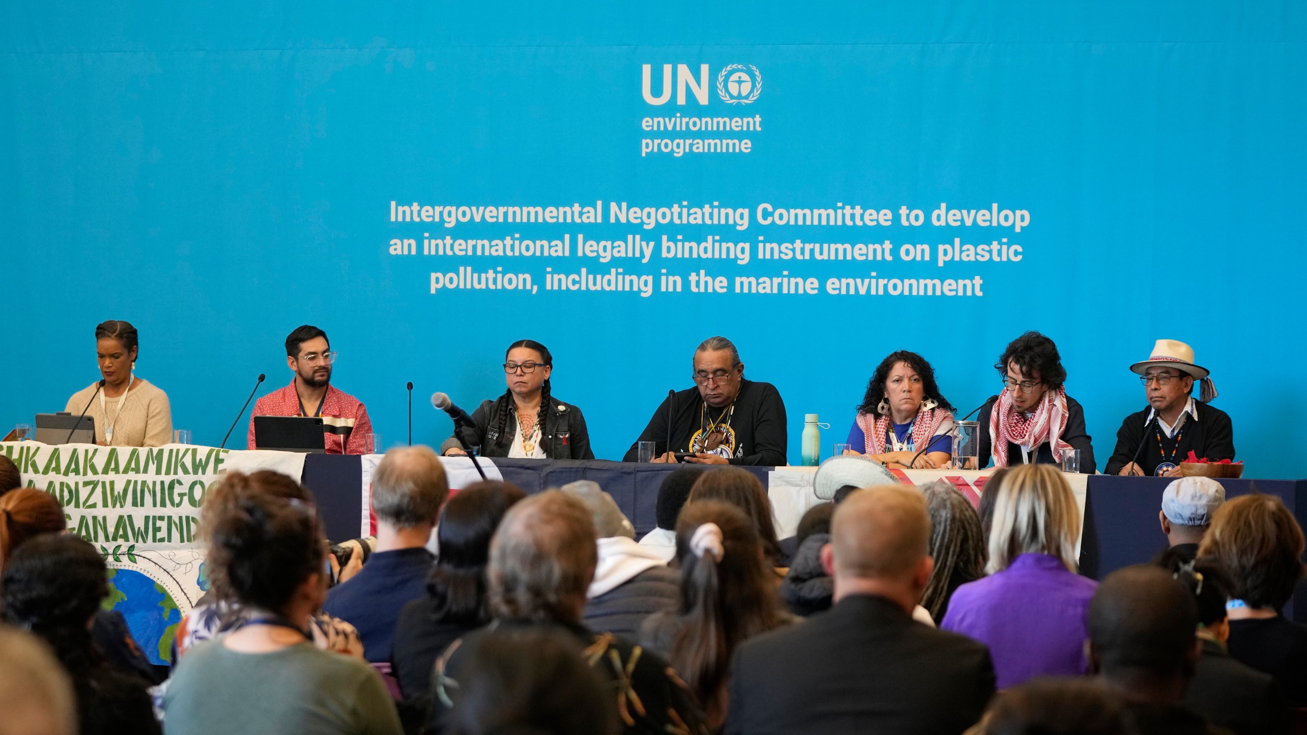 Members of The International Indigenous Peoples' Forum on Plastics attend a press conference at the fifth session of the Intergovernmental Negotiating Committee on Plastic Pollution in Busan, South Korea, Saturday, Nov. 30, 2024. (AP Photo/Ahn Young-joon)