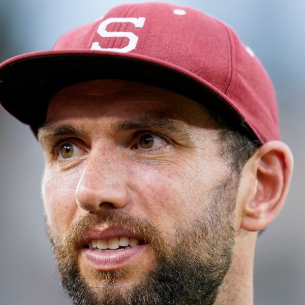 FILE - Former Stanford quarterback Andrew Luck stands on the sideline during the second half of an NCAA college football game against Southern California in Stanford, Calif., Saturday, Sept. 10, 2022. (AP Photo/Godofredo A. Vásquez, File)