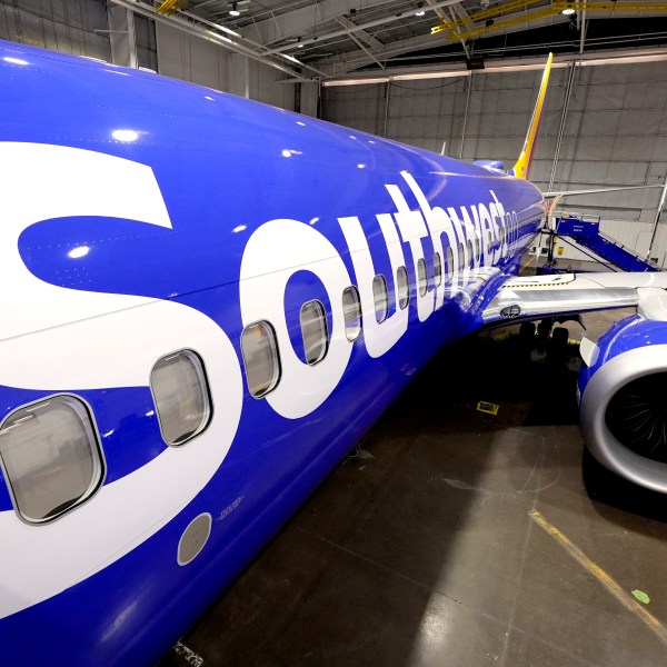 FILE - A retrofitted Southwest Airlines passenger jet is shown in a hangar at Love Field on Sept. 26, 2024, in Dallas. (AP Photo/Tony Gutierrez, File)