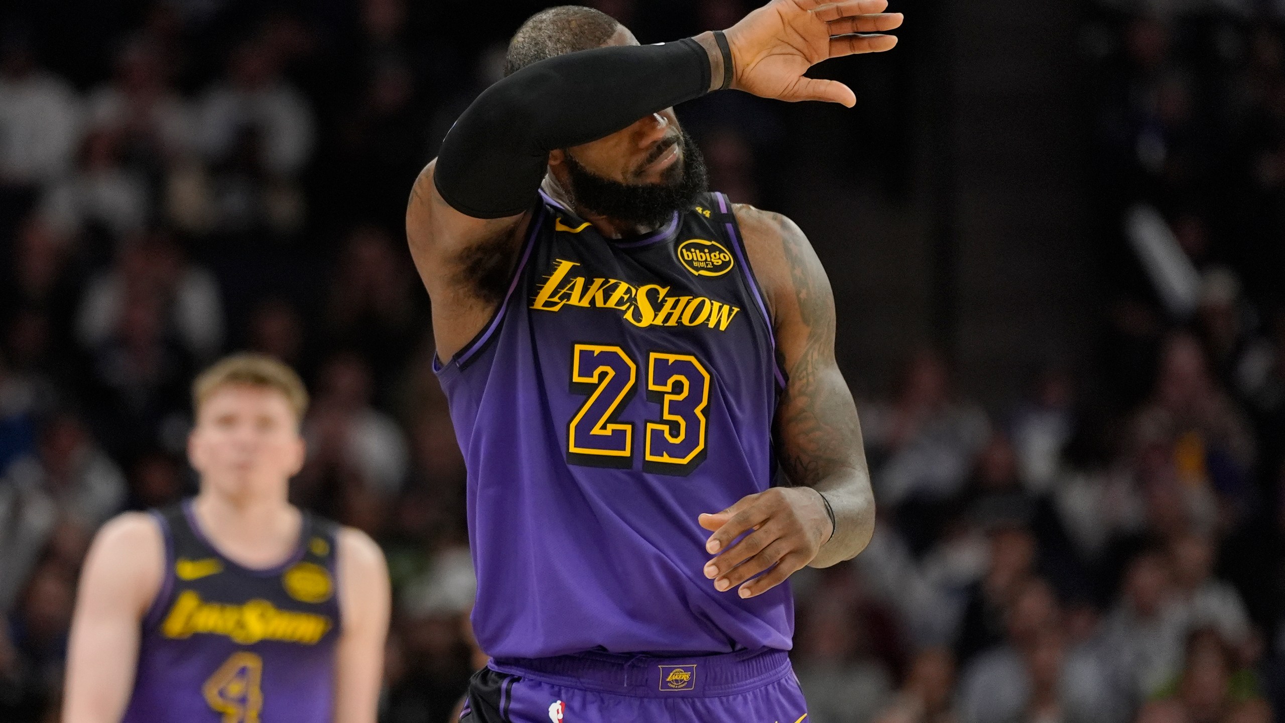 Los Angeles Lakers forward LeBron James (23) walks downcourt during the second half of an NBA basketball game against the Minnesota Timberwolves, Monday, Dec. 2, 2024, in Minneapolis. (AP Photo/Abbie Parr)