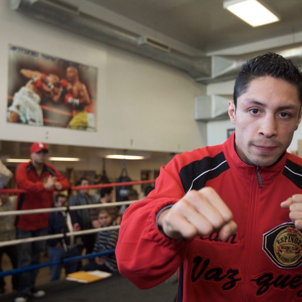 FILE - WBC and The Ring magazine super bantamweight champion Israel Vázquez works out at the South El Monte Boxing Club, in El Monte, Calif., Feb. 25, 2008. The World Boxing Council (WBC) president confirmed on Tuesday, Dec. 3, 2024, that Israel Vázquez, a Mexican fighter who won three world titles in his boxing career, has died. He was 46. (AP Photo/Damian Dovarganes, File)