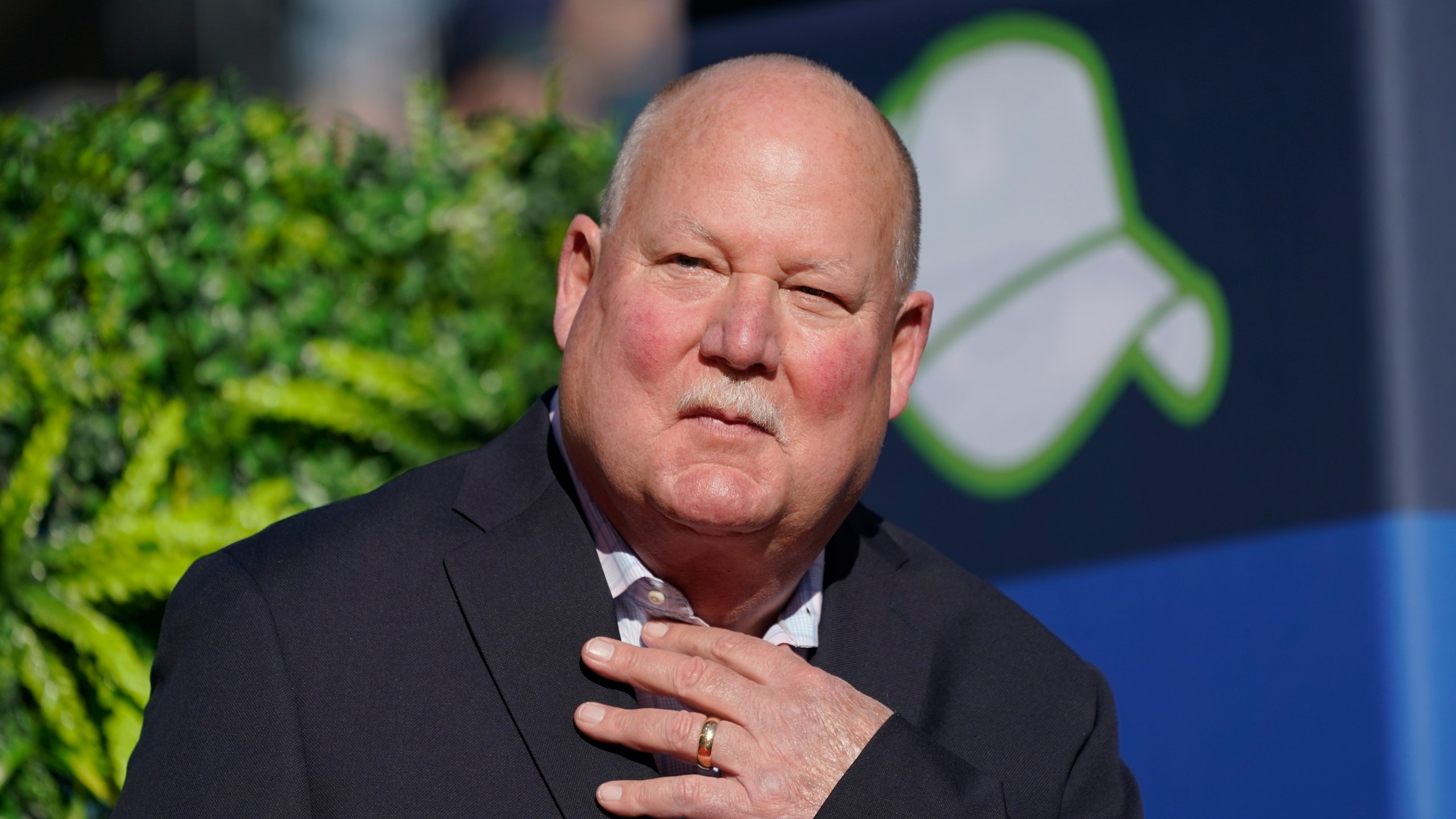 FILE - Former Seattle Seahawks coach Mike Holmgren speaks after being introduced as the newest member of the team's Ring of Honor during halftime in an NFL football game, Sunday, Oct. 31, 2021, in Seattle. (AP Photo/Ted S. Warren, File)