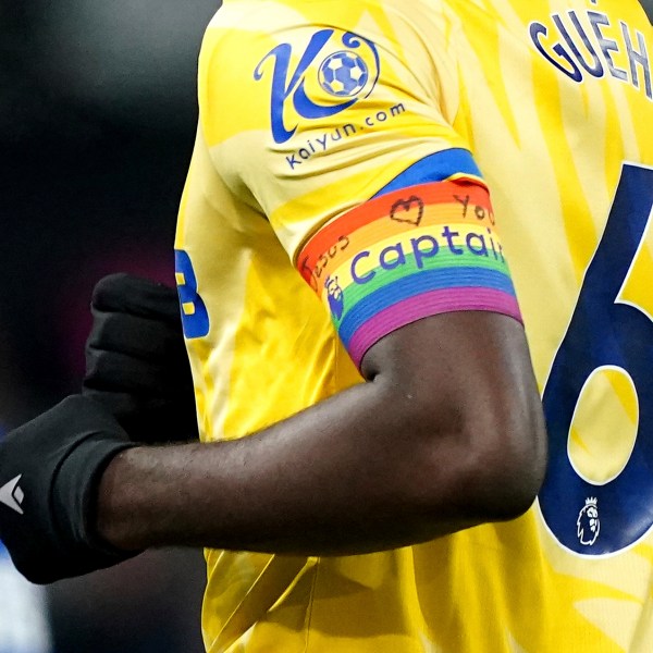 Crystal Palace's Marc Guehi wearing the Rainbow Laces captain's armband which has the words 'Jesus Heart You' on during the England Premier League soccer match between Ipswich Town and Crystal Palace at Portman Road, Ipswich, England, Tuesday, Dec. 3, 2024. (Zac Goodwin/PA via AP)