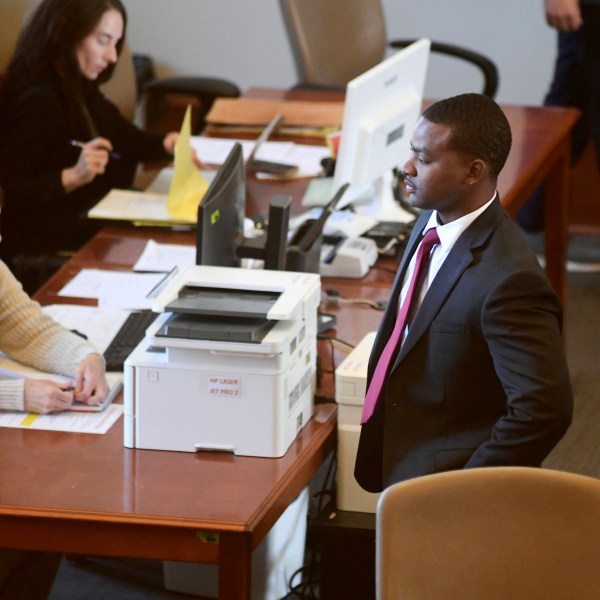 Sheldon Timothy Herrington Jr., who is on trial on a capital murder charge in the 2022 death of University of Mississippi student Jimmie "Jay" Lee, looks out into the courtroom during the lunch break, in Oxford, Miss., on Tuesday, Dec. 3, 2024. (Bruce Newman/The Northeast Mississippi Daily Journal via AP, Pool)