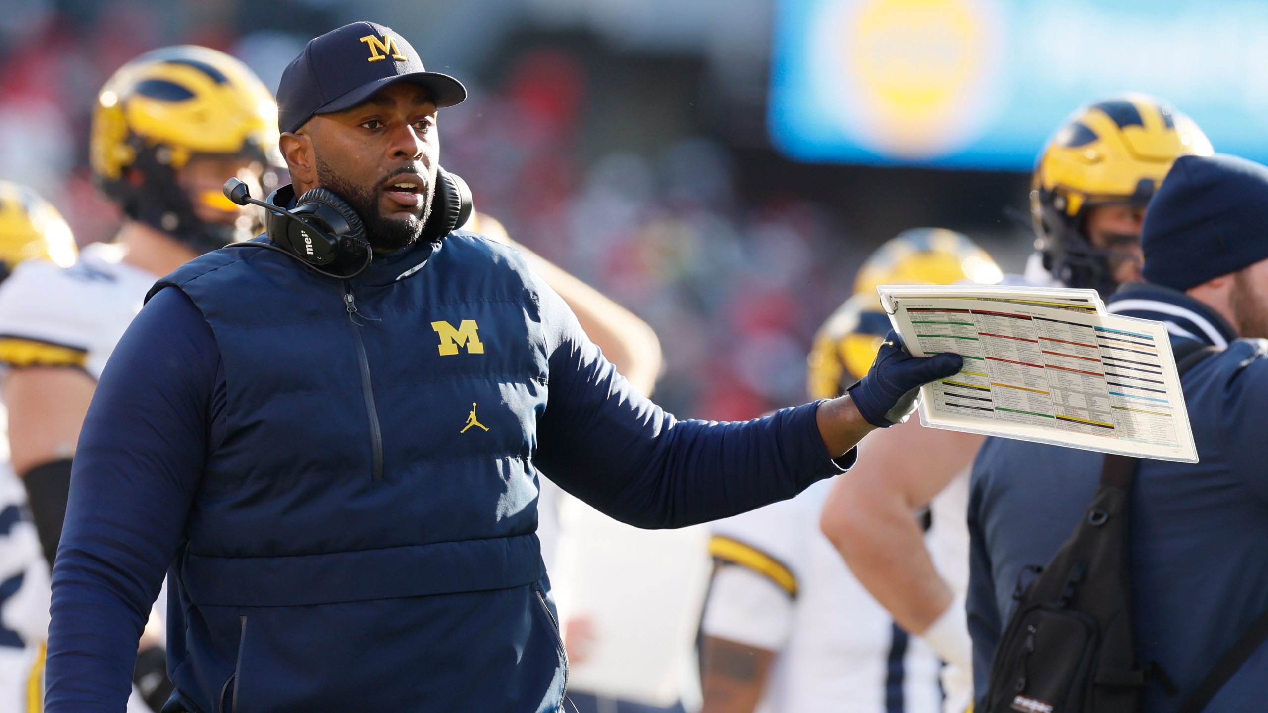 Michigan head coach head coach Sherrone Moore talks to his team during the second half of an NCAA college football game against Michigan Saturday, Nov. 30, 2024, in Columbus, Ohio. (AP Photo/Jay LaPrete)