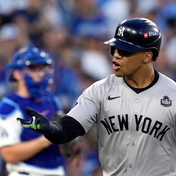 FILE - New York Yankees' Juan Soto celebrates after hitting a home run against the Los Angeles Dodgers during the third inning in Game 2 of the baseball World Series, Saturday, Oct. 26, 2024, in Los Angeles. (AP Photo/Godofredo A. Vásquez, File)