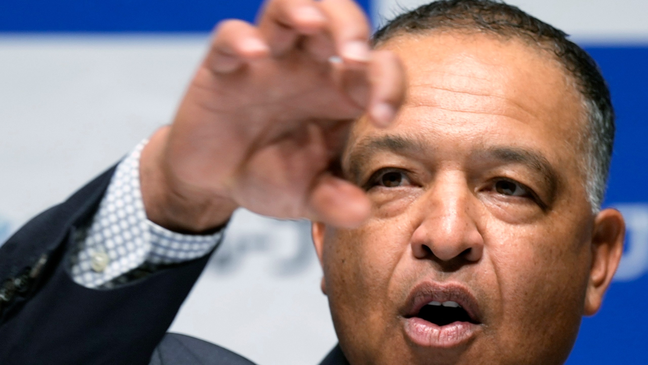 Los Angeles Dodgers manager Dave Roberts attends a press conference on the commercials he appears Wednesday, Dec. 4, 2024, in Tokyo. (AP Photo/Eugene Hoshiko)