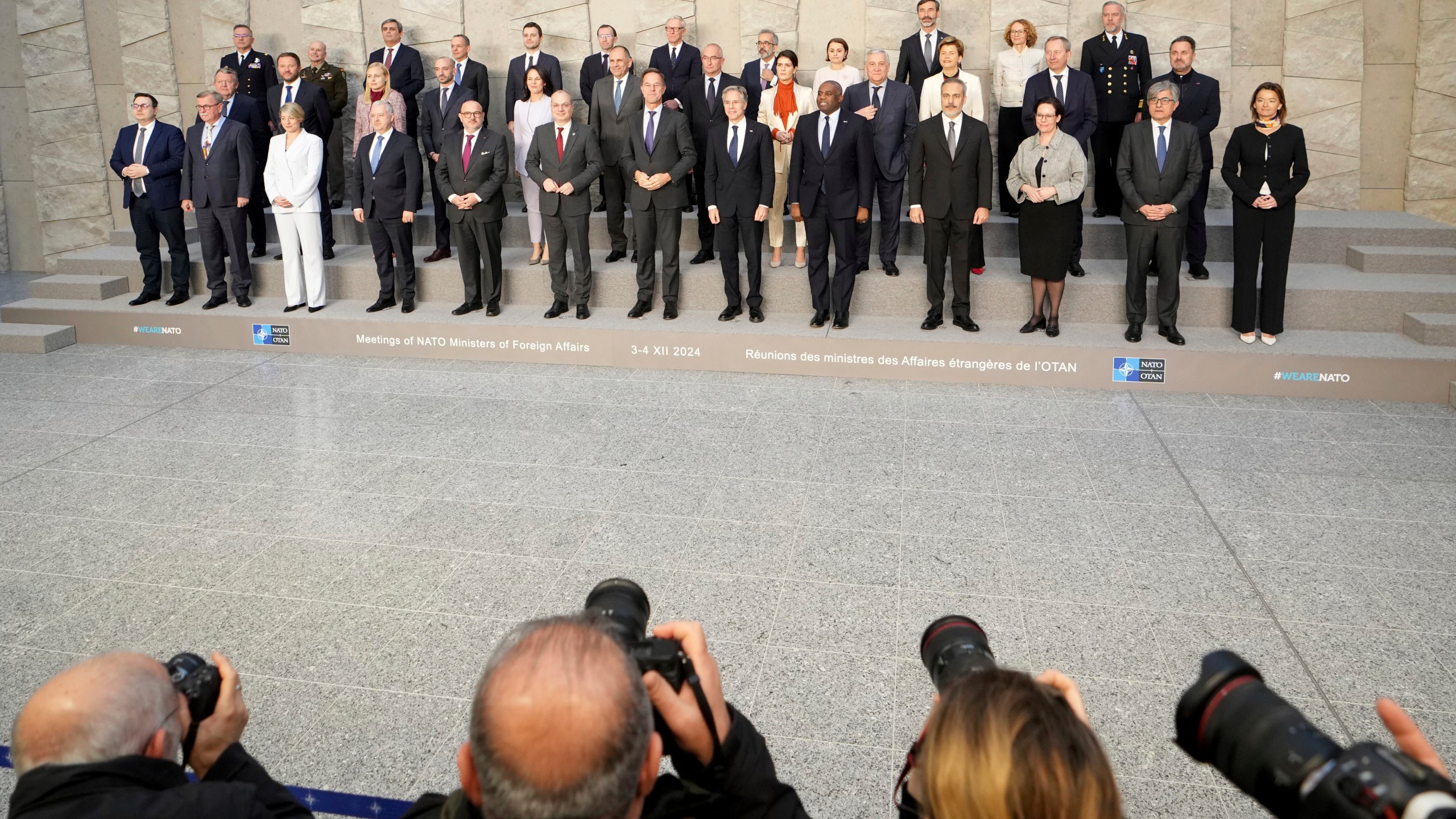 NATO foreign ministers pose for a group photo during a meeting of NATO foreign ministers at NATO headquarters in Brussels, Wednesday, Dec. 4, 2024. (AP Photo/Virginia Mayo)