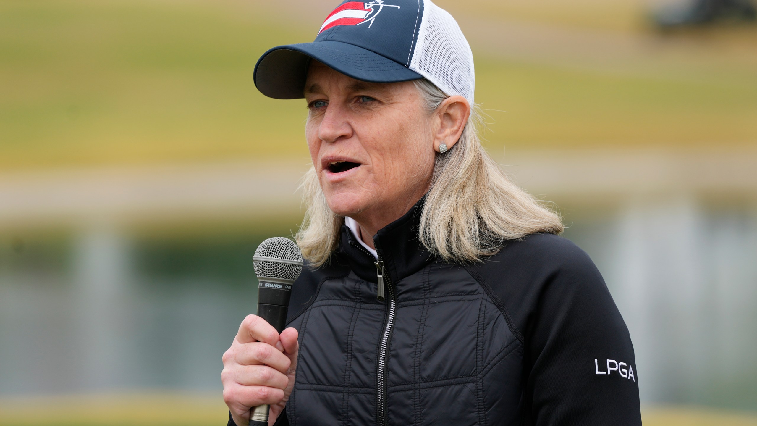 FILE - LPGA commissioner Mollie Marcoux Samaan speaks to the gallery after the final round of the LPGA Ford Championship golf tournament Sunday, March 31, 2024, in Gilbert, Ariz. (AP Photo/Ross D. Franklin, File)