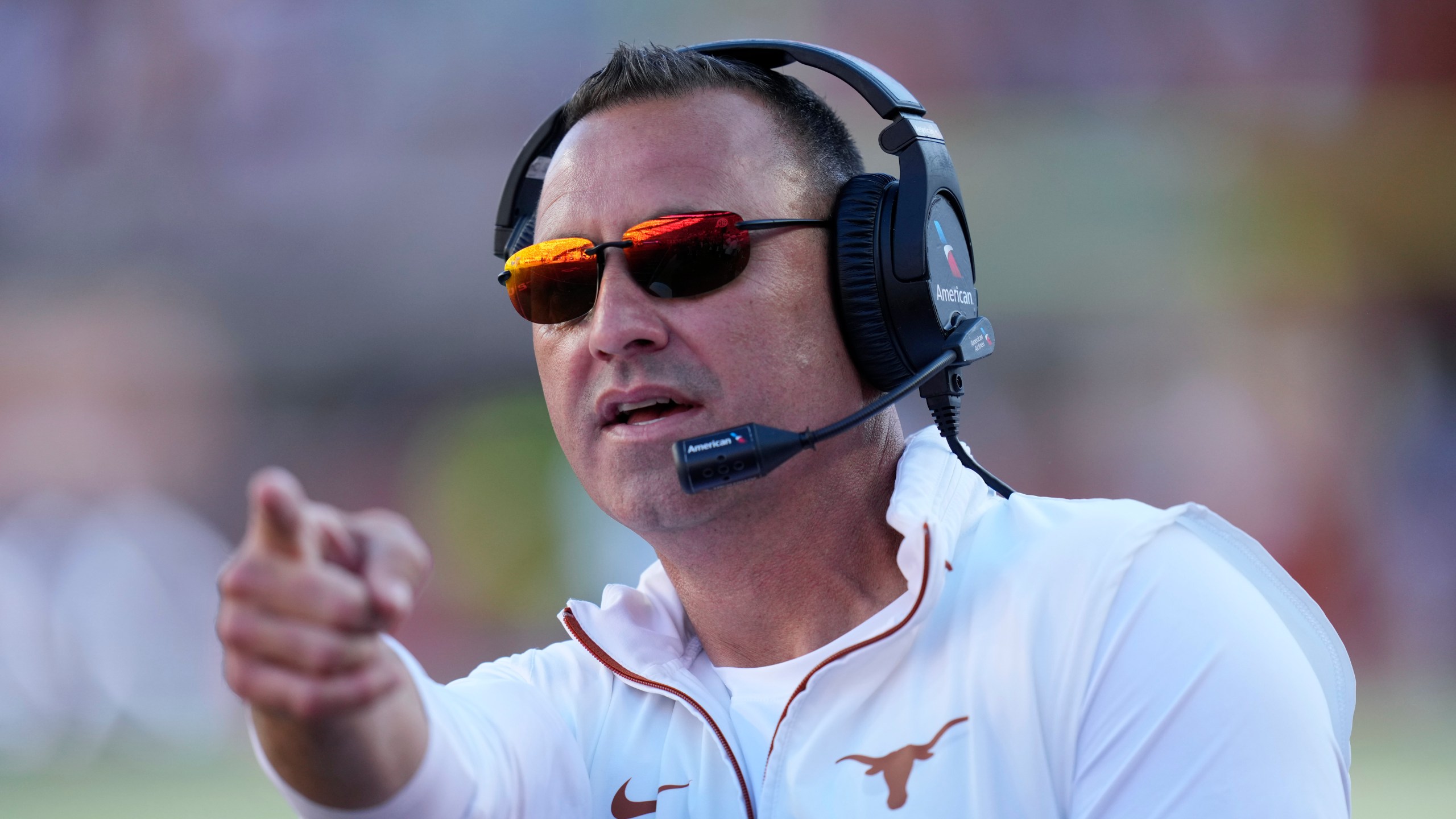 Texas head coach Steve Sarkisian signals during the first half of an NCAA college football game against Kentucky in Austin, Texas, Saturday, Nov. 23, 2024. (AP Photo/Eric Gay)