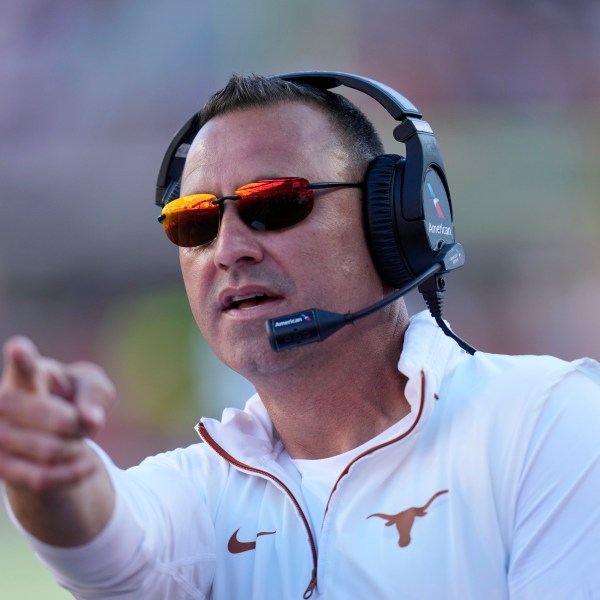 Texas head coach Steve Sarkisian signals during the first half of an NCAA college football game against Kentucky in Austin, Texas, Saturday, Nov. 23, 2024. (AP Photo/Eric Gay)