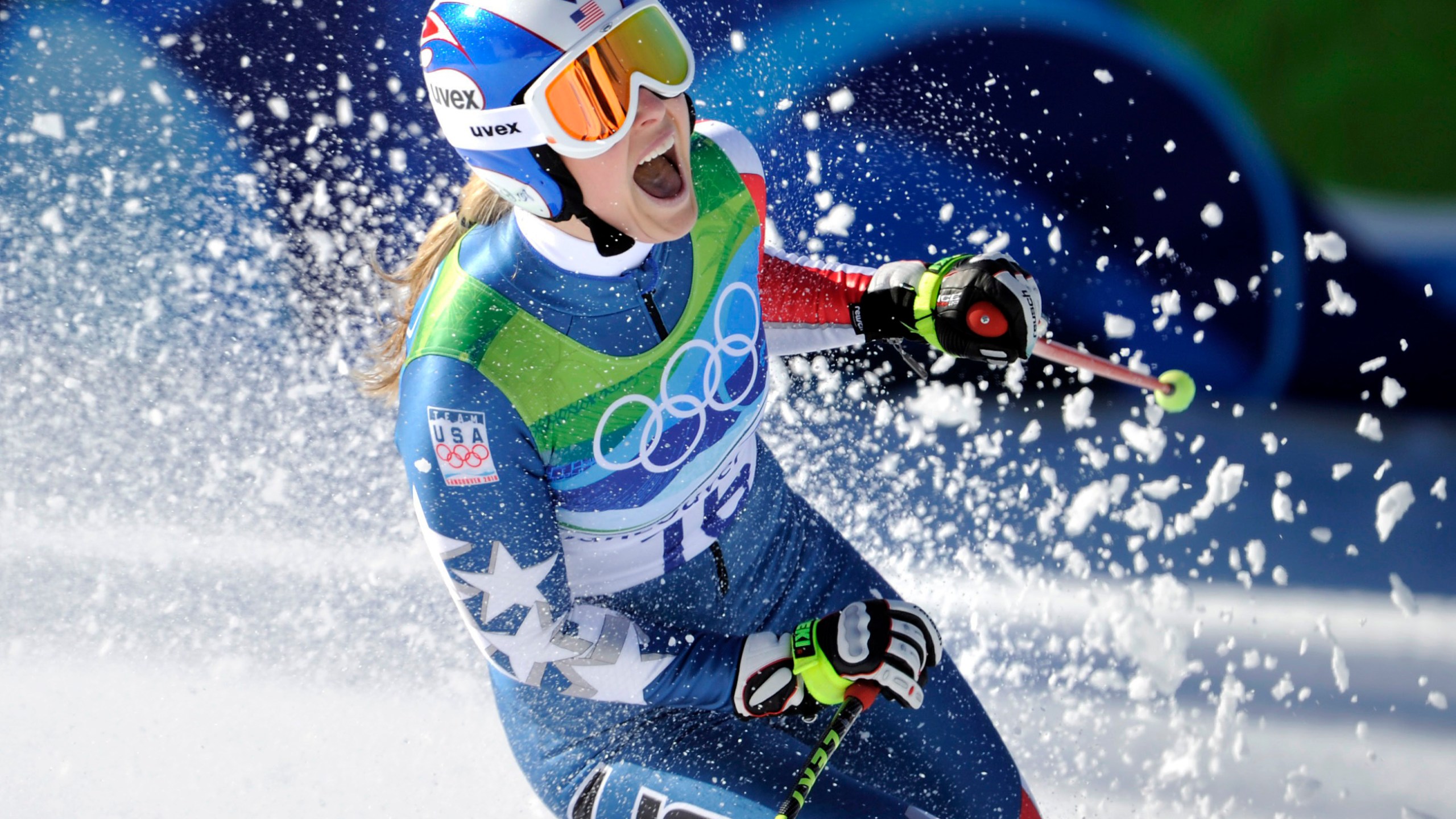 FILE - Lindsey Vonn of the United States, reacts in the finish area after completing the Women's downhill at the Vancouver 2010 Olympics in Whistler, British Columbia, Feb. 17, 2010. (AP Photo/Gero Breloer, File)