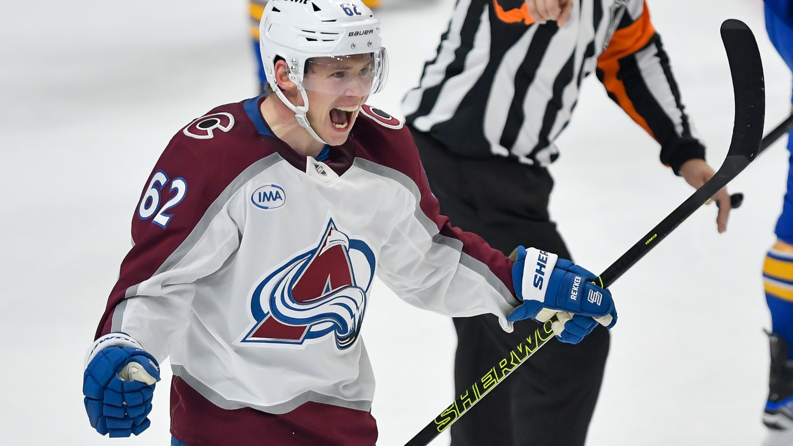 Colorado Avalanche left wing Artturi Lehkonen (62) celebrates after scoring during the third period of an NHL hockey game against the Buffalo Sabres in Buffalo, N.Y., Tuesday, Dec. 3, 2024. (AP Photo/Adrian Kraus)