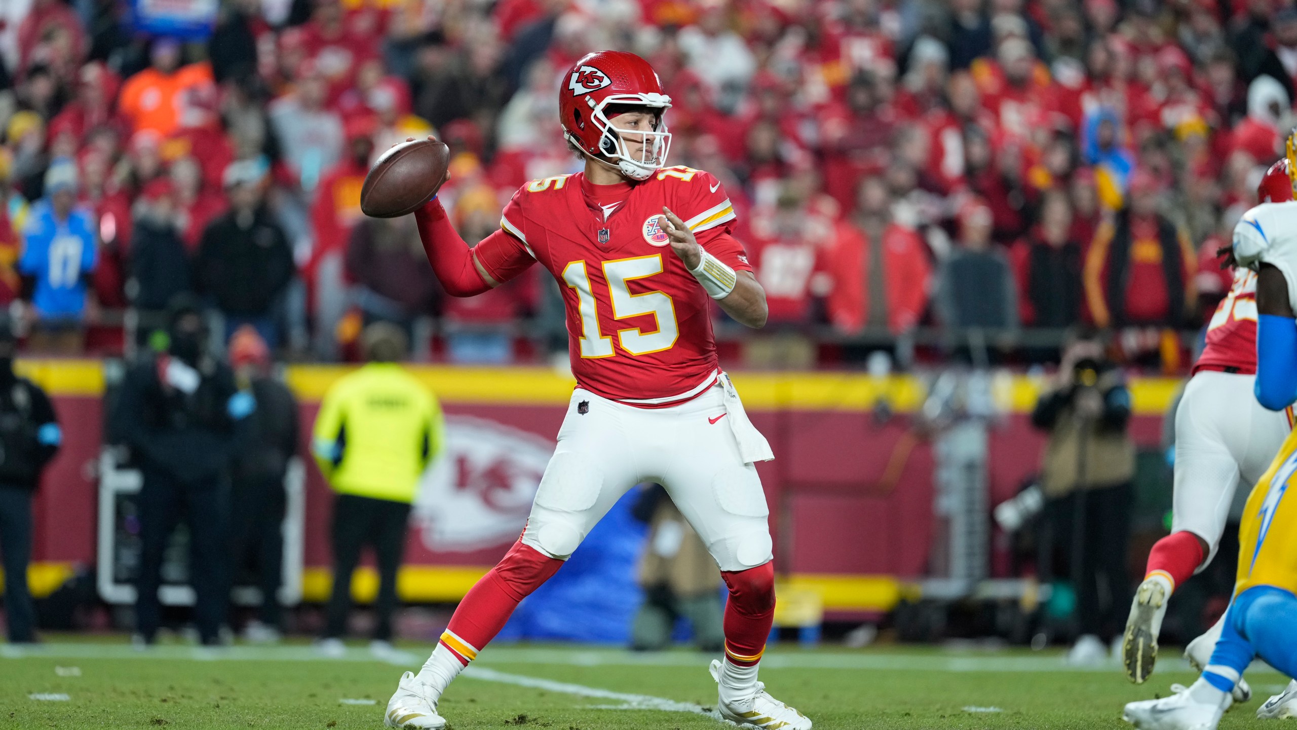 Kansas City Chiefs quarterback Patrick Mahomes throws during the first half of an NFL football game against the Los Angeles Chargers Sunday, Dec. 8, 2024, in Kansas City, Mo. (AP Photo/Ed Zurga)