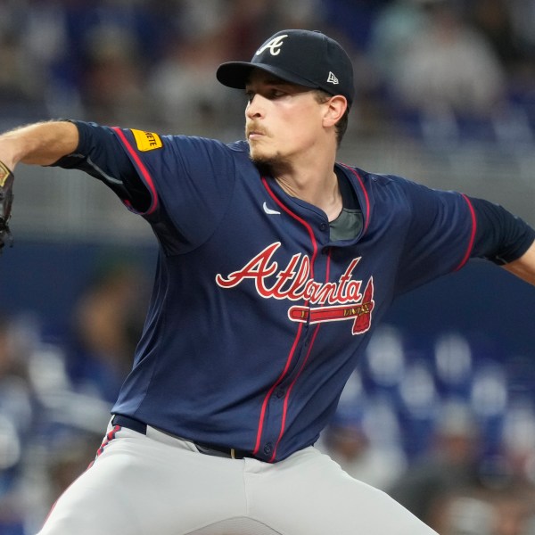 FILE - Atlanta Braves starting pitcher Max Fried aims a pitch during the third inning of a baseball game against the Miami Marlins, Saturday, Sept. 21, 2024, in Miami. (AP Photo/Marta Lavandier, File)