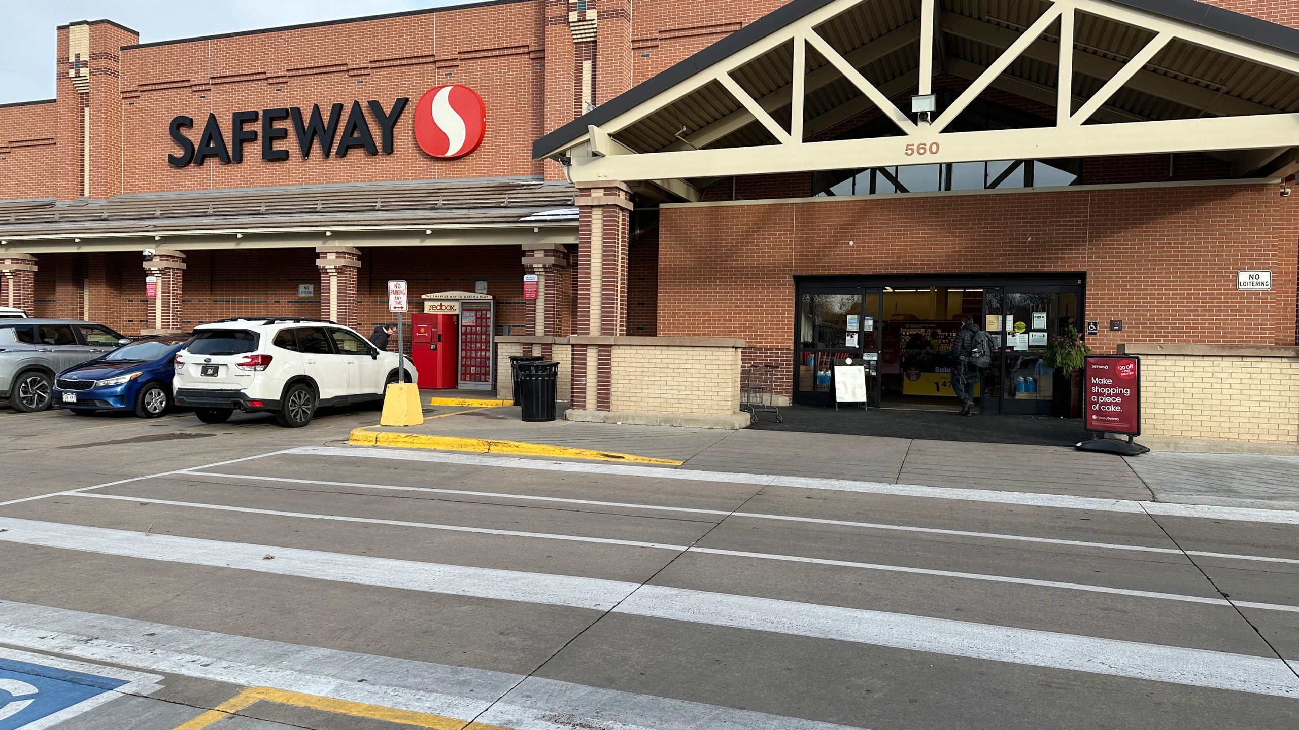 A shopper heads into a Safeway store, which is part of the Albertson's grocery chain, Tuesday, Dec. 10, 2024, in Denver. (AP Photo/David Zalubowski)