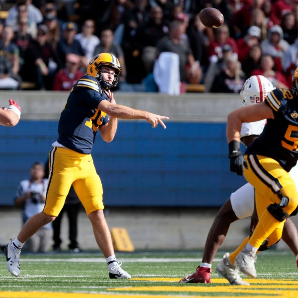 California quarterback Fernando Mendoza (15) throws a pass during the fourth quarter of an NCAA college football game against the Stanford at Memorial Stadium in Berkeley, Calif., on Saturday, Nov. 23, 2024. (Santiago Mejia/San Francisco Chronicle via AP)