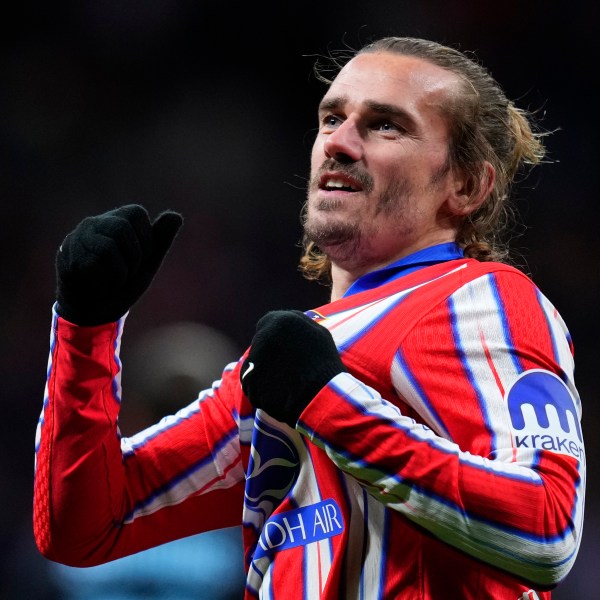 Atletico Madrid's Antoine Griezmann celebrates after scoring his side's third goal during the Champions League opening phase soccer match between Atletico Madrid and Slovan Bratislava at Riyadh Air Metropolitano stadium in Madrid, Spain, Wednesday, Dec. 11, 2024. (AP Photo/Manu Fernandez)