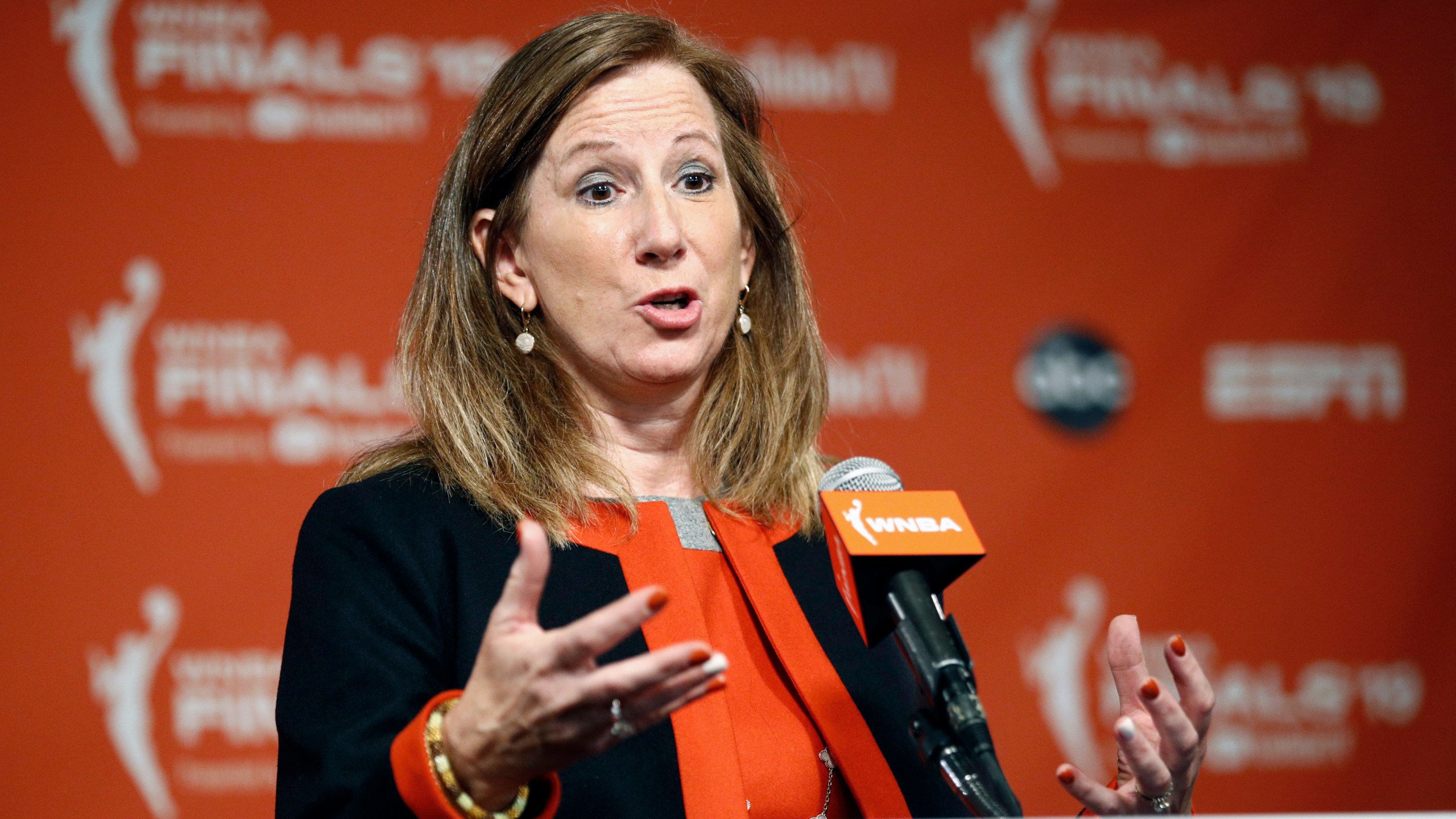 FILE - WNBA Commissioner Cathy Engelbert speaks at a news conference before Game 1 of basketball's WNBA Finals between the Connecticut Sun and the Washington Mystics, Sunday, Sept. 29, 2019, in Washington. (AP Photo/Patrick Semansky, File)