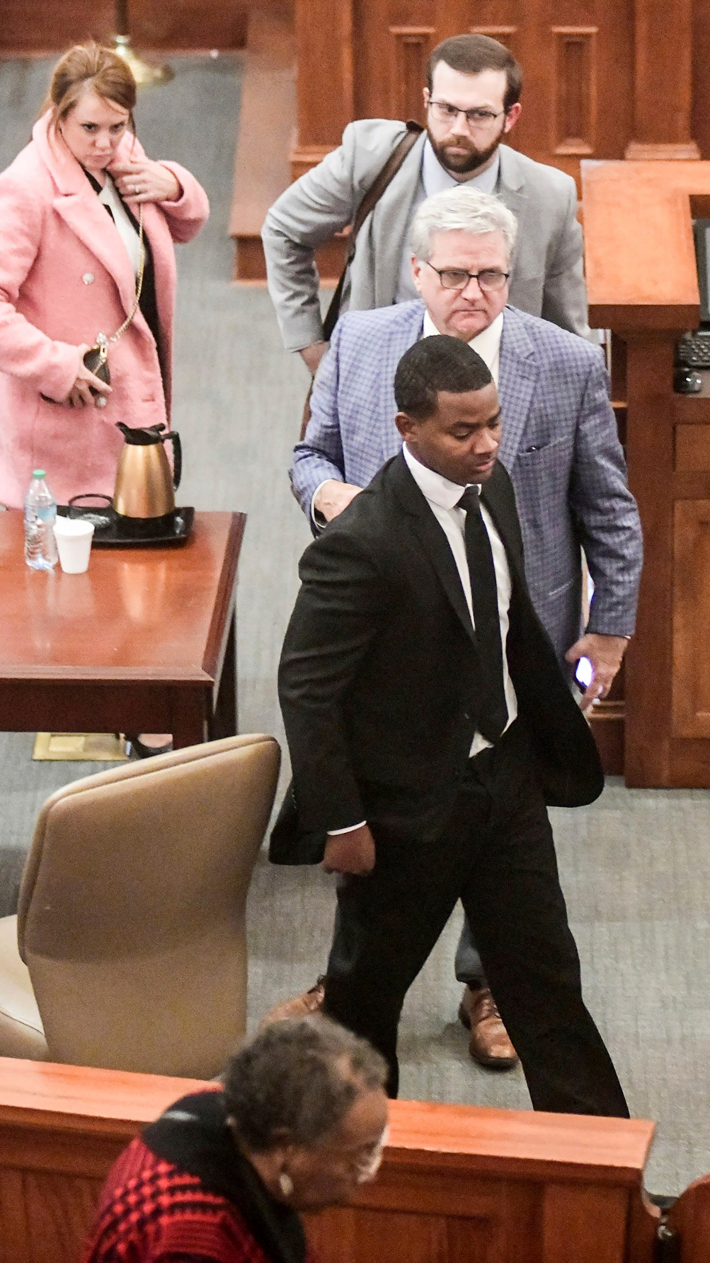 Sheldon "Timothy" Herrington Jr., foreground, who was on trial for the murder of University of Mississippi student Jimmie "Jay" Lee, and his defense team leave court after a mistrial was declared, at the Lafayette County Courthouse in Oxford, Miss. on Wednesday, Dec. 11, 2024. (Bruce Newman/The Northeast Mississippi Daily Journal, via AP, Pool)