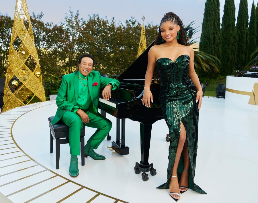 This promotional image released by NBC shows Smokey Robinson, left, and Halle Bailey, who will host the holiday special "A Motown Christmas." (NBCUniversal via AP)