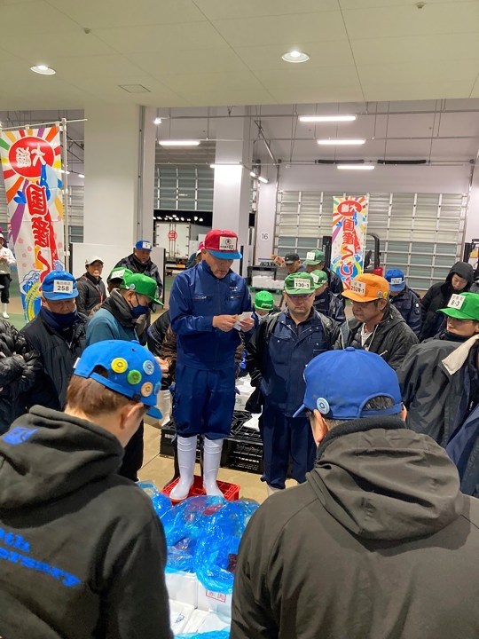 This photo released by Shimonoseki City, Agriculture, Forestry and Fisheries Maintenance Division shows an auction selling fresh meat of fin whales at a fish market in Shimonoseki, Yamaguchi prefecture, southern Japan Thursday, Dec. 12, 2024. (Shimonoseki City, Agriculture, Forestry and Fisheries Maintenance Division via AP)