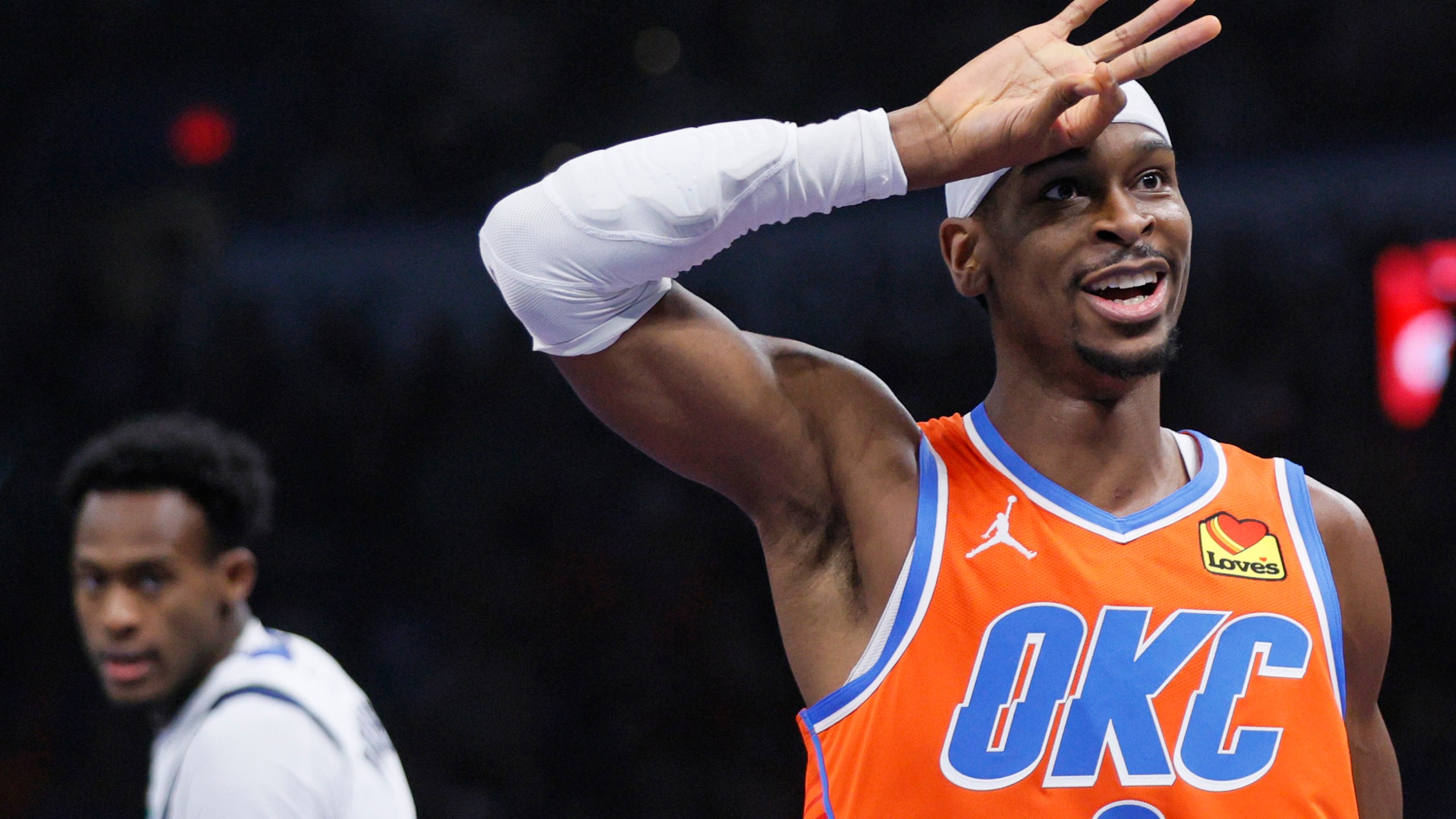 Oklahoma City Thunder guard Shai Gilgeous-Alexander gestures after making a 3-pointer during the first half of an Emirates NBA Cup basketball game against the Dallas Mavericks, Tuesday, Dec. 10, 2024, in Oklahoma City. (AP Photo/Nate Billings)