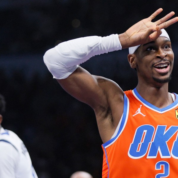 Oklahoma City Thunder guard Shai Gilgeous-Alexander gestures after making a 3-pointer during the first half of an Emirates NBA Cup basketball game against the Dallas Mavericks, Tuesday, Dec. 10, 2024, in Oklahoma City. (AP Photo/Nate Billings)