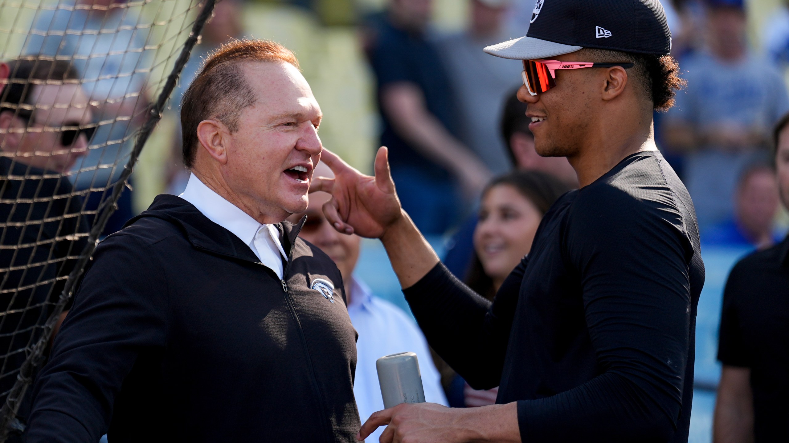 FILE - New York Yankees' Juan Soto talks with agent Scott Boras before Game 1 of the baseball World Series against the Los Angeles Dodgers, Friday, Oct. 25, 2024, in Los Angeles. (AP Photo/Julio Cortez, File)