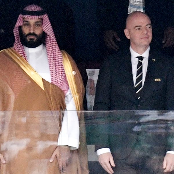 FILE - Saudi Arabia Crown Prince Mohammed bin Salman, left, and FIFA President Gianni Infantino, stand for the anthem prior to opening soccer match of the 2018 World Cup between Russia and Saudi Arabia at the Luzhniki stadium in Moscow, Russia, on June 14, 2018. (Alexei Nikolsky/Sputnik, Kremlin Pool Photo via AP, File)