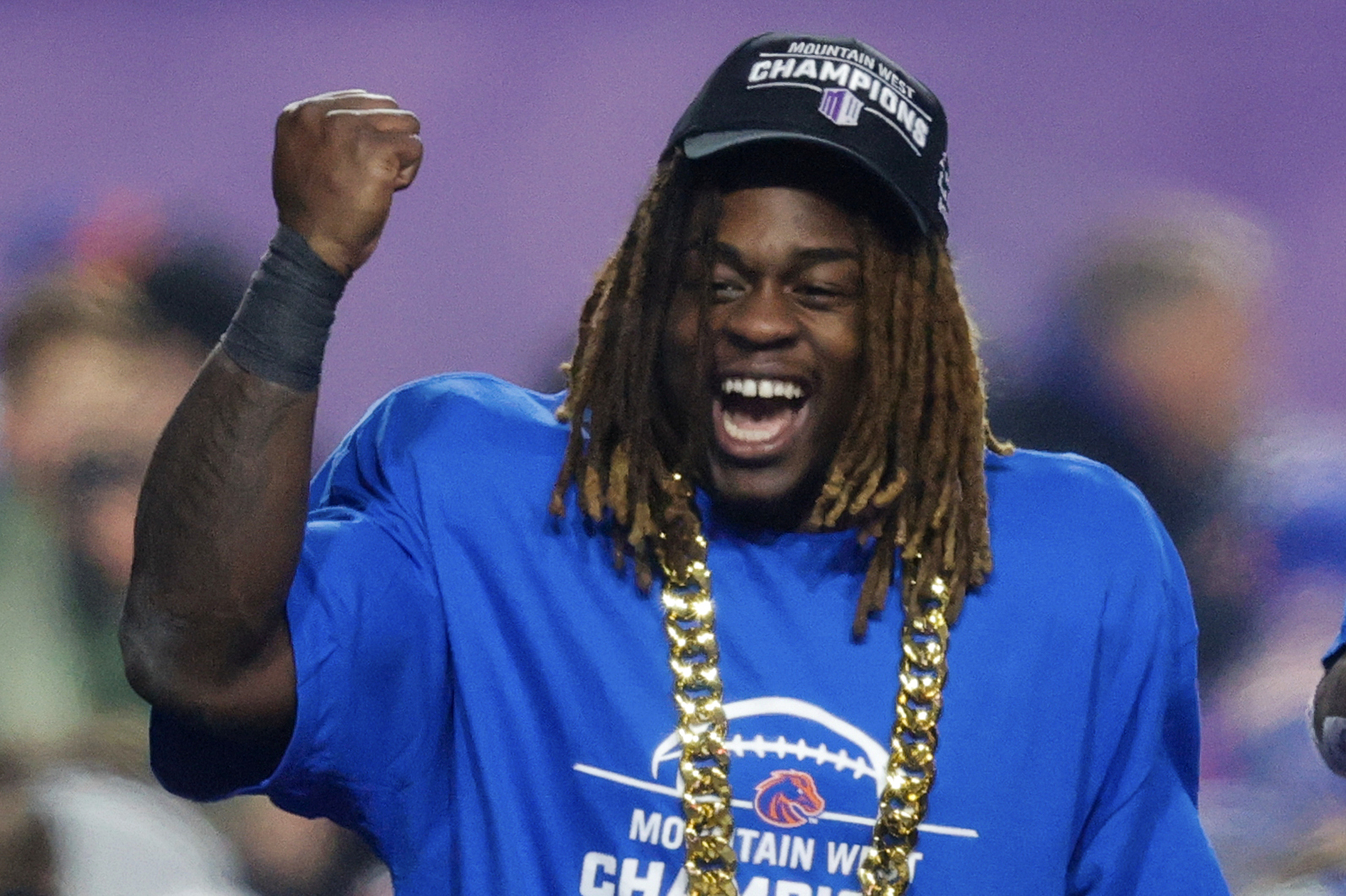 FILE - Boise State running back Ashton Jeanty celebrates after winning the offensive player of the game for the Mountain West Championship NCAA college football game against UNLV, Friday, Dec. 6, 2024, in Boise, Idaho. (AP Photo/Steve Conner, File)