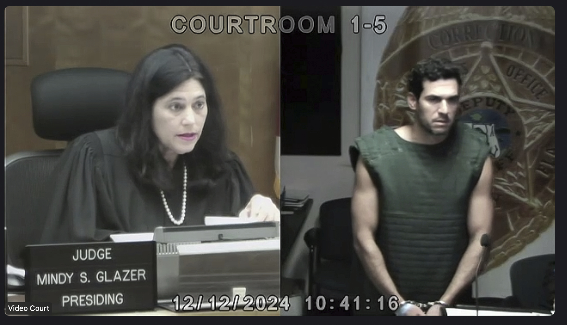 In this screenshot, Miami Dade Circuit Court Judge Mindy S. Glazer is seen via video presiding over the first court appearance of Oren Alexander, who is charged with sexual battery along with his twin brother, Alon Alexander, on Dec. 12, 2024, in Miami. (Miami Dade Circuit Court via AP, Pool)