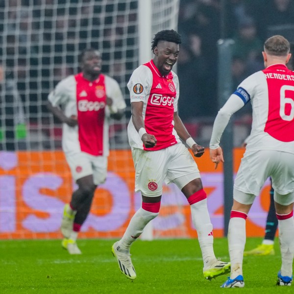 Ajax's Bertrand Traore, centre, celebrates after scoring during the Europa League soccer match between Ajax and Lazio Roma at the Johan Cruyff Arena in Amsterdam, Netherlands, Thursday, Dec. 12, 2024. (AP Photo/Peter Dejong)