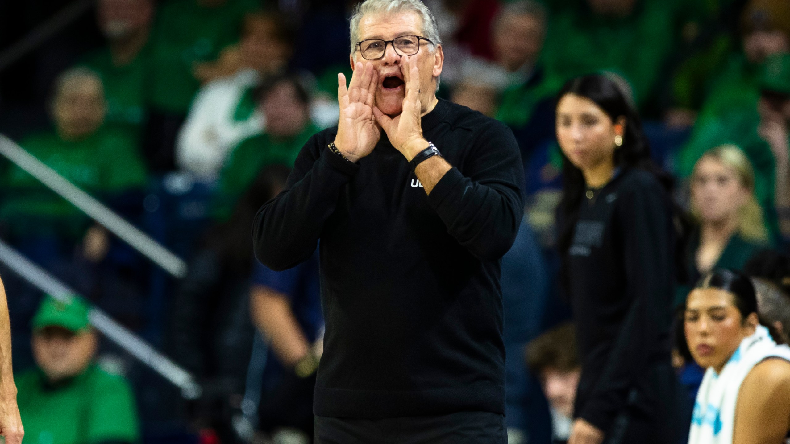 UConn head coach Geno Auriemma shouts towards the court during the first half of an NCAA college basketball game against Notre Dame, Thursday, Dec. 12, 2024, in South Bend, Ind. (AP Photo/Michael Caterina)