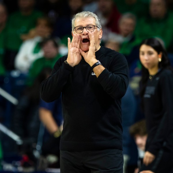 UConn head coach Geno Auriemma shouts towards the court during the first half of an NCAA college basketball game against Notre Dame, Thursday, Dec. 12, 2024, in South Bend, Ind. (AP Photo/Michael Caterina)