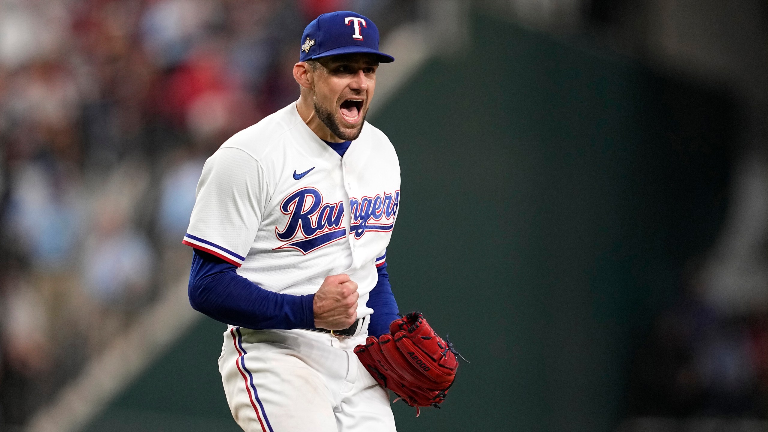 FILE - In this Oct. 10, 2023, photo, Texas Rangers starting pitcher Nathan Eovaldi celebrates on the mound after getting an out against the Baltimore Orioles in Game 3 of an American League Division Series baseball game in Arlington, Texas. (AP Photo/Tony Gutierrez, file)